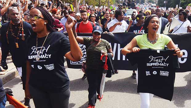 Tens of thousands pour into Boston streets to decry hate Tens of thousands pour into Boston streets to decry hate