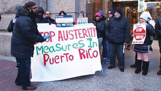 Activists protest Santander bank’s role in Puerto Rico debt crisis