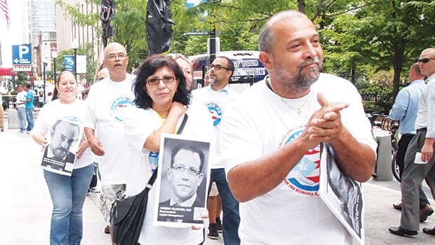 Protesters condemn CEOs who profit off Puerto Rico’s debt