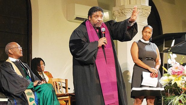 Rev. Barber, in Boston, urges a moral lens on policy issues