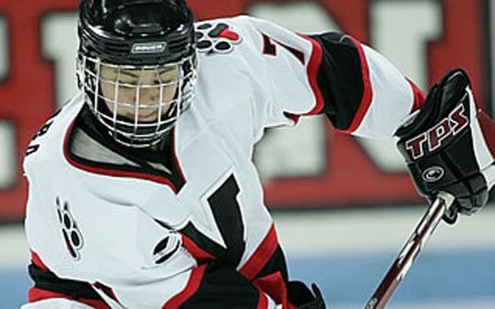NU hockey standout sets sights on higher goal NU hockey standout sets sights on higher goal