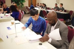 A Boston business owner receives a free legal consultation at the BizGrow event on June 20, 2018. Photo: Renato Castelo