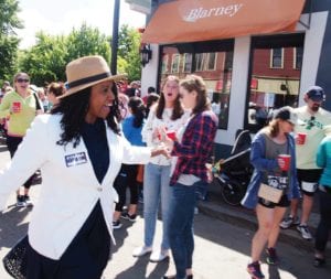 Ayanna Pressley greet Dorchester residents. Banner Photo