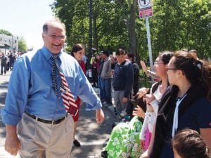 Michael Capuano greet Dorchester residents. Banner Photo