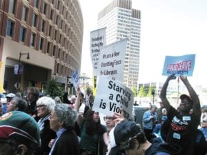 Demonstrators with Raise Up Massachusetts and the Poor People’s Campaign march through downtown Boston. photo: Saphia Suarez