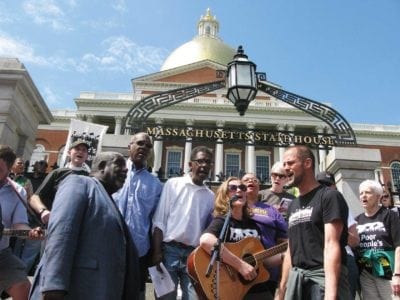 Demonstrators calling for $15 wage block downtown traffic with sit-in demonstration