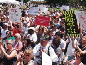 Demonstrators on the Boston Common. Banner photo