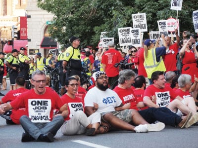 Hotel workers march for better working conditions