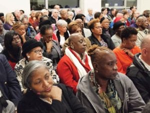 Members of the Greater Boston Interfaith Organization listen to the politicians’ campaign promises at the Islamic Society of Boston Cultural Center in Roxbury. Banner Photo