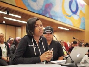 Urban Science Academy senior Ajanae Nunez testifies before the Boston School Committee. Banner Photo