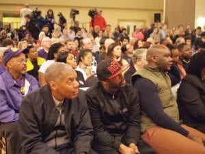 A standing room-only crowd packed the venue. Banner Photo