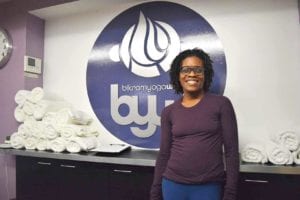 Kendra Blackett-Dibinga’s new Boston yoga studio is one of five she and her husband own on the East Coast. — Banner Photo