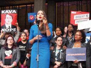 Congresswoman-elect Alexandria Ocasio-Cortez addresses demonstrators at a September rally at Boston City Hall protesting Brett Kavanaugh’s nomination to the Supreme Court. —Banner Photo