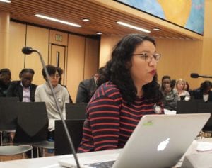 Boston Education Justice Alliance Executive Director Ruby Reyes testifies in front of the School Committee. BANNER PHOTO