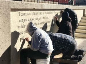 Workers repaint inscriptions at the Martin Luther King Jr. Center in Atlanta. PHOTO: RICK HOLMES