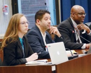 (l-r) Shira DeCovnick, BPS director of turnaround and transformation, Sam DePina, BPS operational superintendent, Kevin McCaskill, Madison Park Technical Vocational High School executive director were part of a panel testifying at a city council education committee hearing April 9. PHOTO: SANDRA LARSON