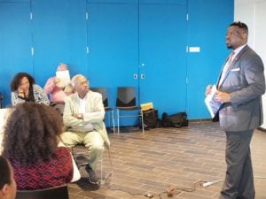 BPDA Deputy Director for Community Economic Development Dana Whiteside leads the discussion on the Rio Grande project at the Bruce Bolling Municipal Building. BANNER PHOTO
