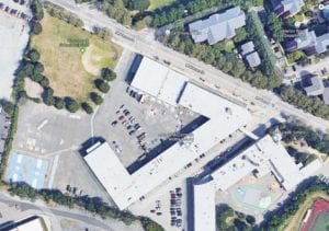 Under the terms of a Boston Public Schools request for proposal, the Boys and Girls Clubs of Dorchester could obtain a lease for the sports field and basketball courts at left in the image above, taken from Google Maps.