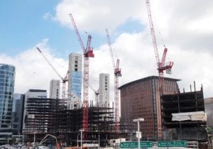Construction cranes and the steel framing of luxury condo towers have become a constant feature of the city’s skyline. BANNER PHOTO