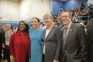 Teacher Zena Link, State Sen. Sonia Chang Diaz and state Reps. Mary Keefe of Worcester and Aaron Vega of Holyoke enjoy a moment after the Student Opportunity Act was signed into law at English High School. PHOTO: COURTESY SONIA CHANG DIAZ