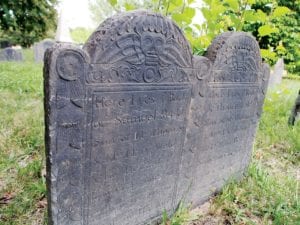 Many stones, such as these un-dated 18th century slate markers, are remarkably well preserved. BANNER PHOTO