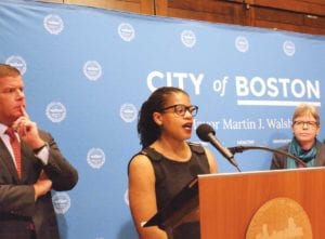 City Councilor Lydia Edwards addresses reporters, flanked by Mayor Martin Walsh and Councilor Liz Breadon. BANNER PHOTO
