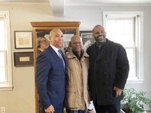 Herb and Galen Medley grab a photo with Deval Patrick after walking along Portsmouth’s Black History Trail with the former Massachusetts governor. PHOTO: BRIAN O’CONNOR