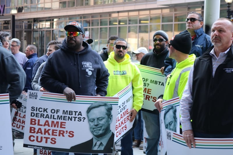 Demonstrators blast Baker on MBTA cuts Demonstrators blast Baker on MBTA cuts