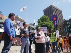Gina Alkiewicz, a staff member at the North American Indian Center of Boston, speaks during a press conference last week. BANNER PHOTO