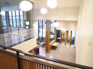 Renovations to the Roxbury branch of the Boston Public Library include new furniture, windows, lighting and outdoor spaces. The large windows overlooking Dudley and Warren streets and reconstructed sidewalks and outdoor spaces are meant to reconnect the library to the surrounding neighborhood. BANNER PHOTO