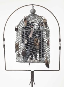 “Serving Time,” 2010. Metal cage with stand, figures, keys, and locks. Collection of Neil Lane, courtesy of the artist and Roberts Projects, Los Angeles, California. Photography by Robert Wedemeyer. © Betye Saar.