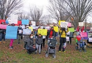 Demonstrators at Justice Edward O. Goudin Veterans Memorial Park. BANNER PHOTO