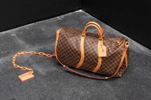 “FOR THE LOVE OF MONEY,” 2018 Coated canvas, natural cowhide, leather trimmings, cotton textile lining, and ceramic chain Courtesy Gymnastics Art Institute © Virgil Abloh