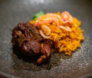 Jollof Rice with Ginger Red Wine Braised Goat PHOTO: COURTESY OF COMFORT KITCHEN