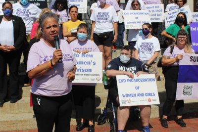 Activists march against prison