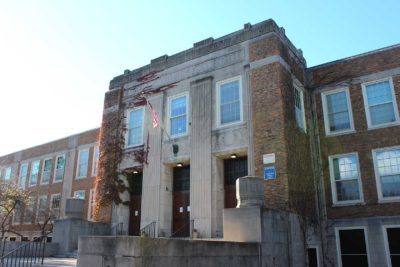 COVID cases close Curley school